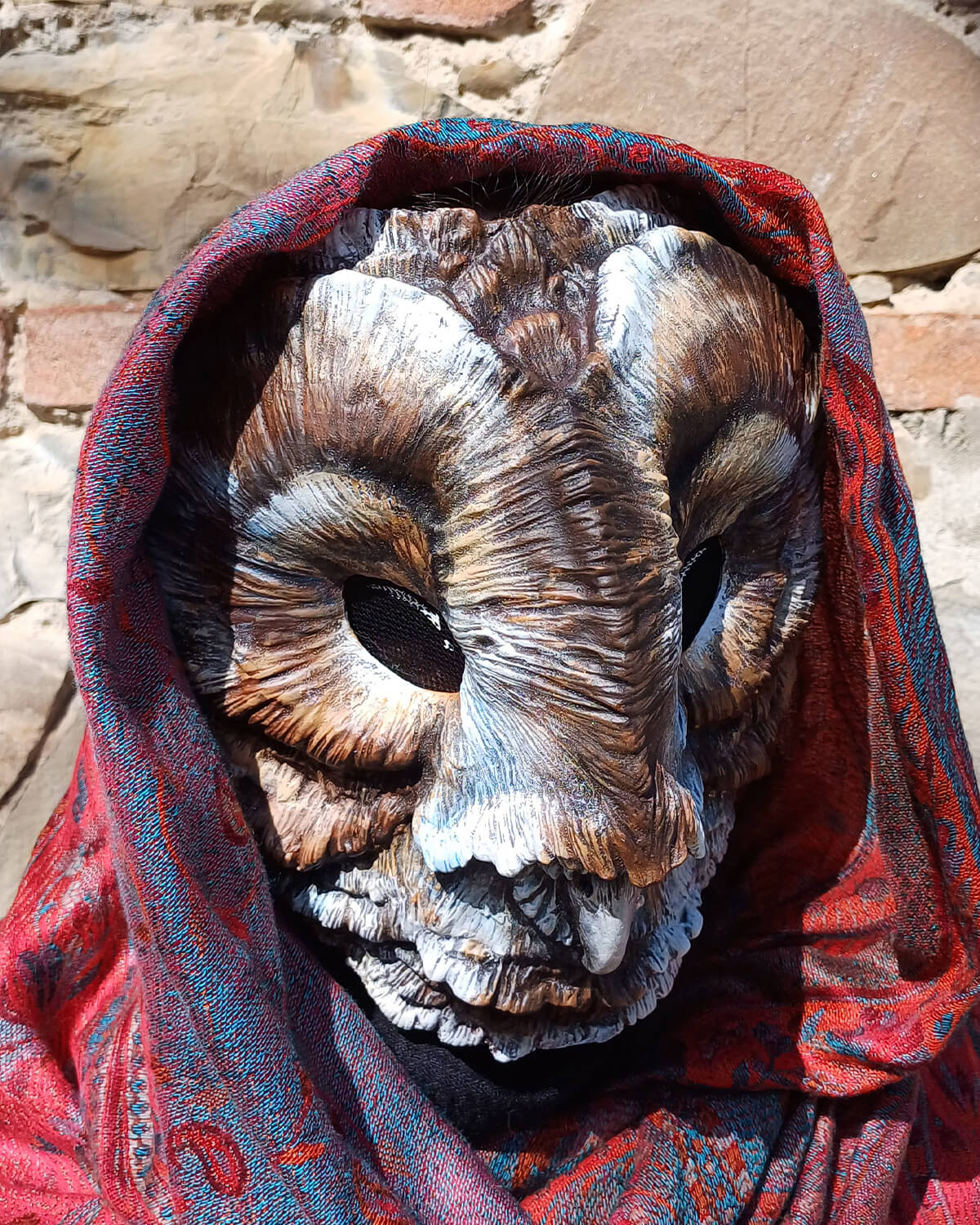 The elegant and detailed design of the Brown Barn Owl mask, a unique piece of wearable ar
