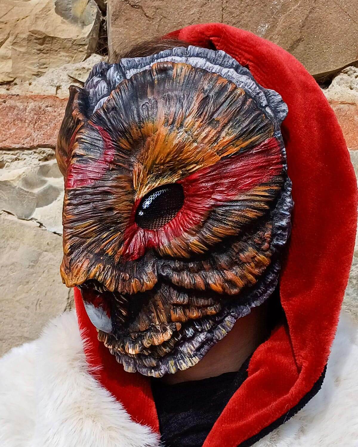 Detail of the front of the Shaman Barn Owl mask, focusing on the eyes that convey a deep and spiritual look