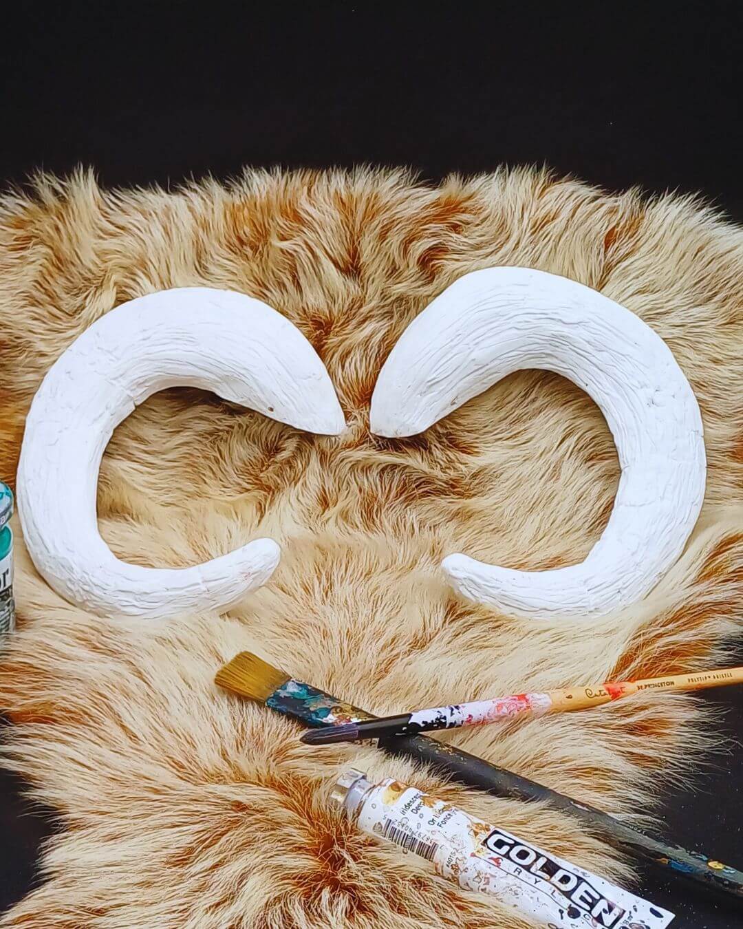 Curved blank resin horns – handmade, realistic cosplay accessory for LARP, costumes, and fantasy characters.