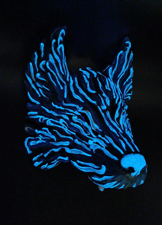 Detailed view of the menacing fangs and piercing eyes of the Fenrir mask.