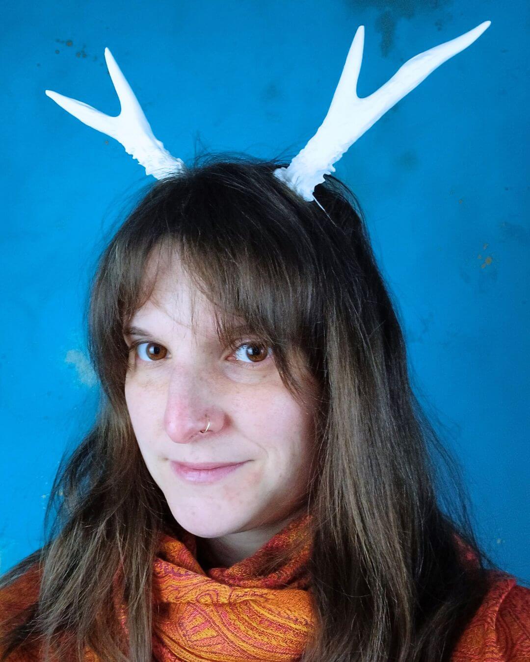 Faun resin horns worn for LARP & cosplay – custom-made, comfortable costume horns for immersive roleplay.