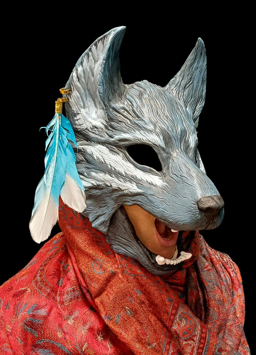 Side view of the grey wolf mask with articulated jaw being worn, showcasing the fit.