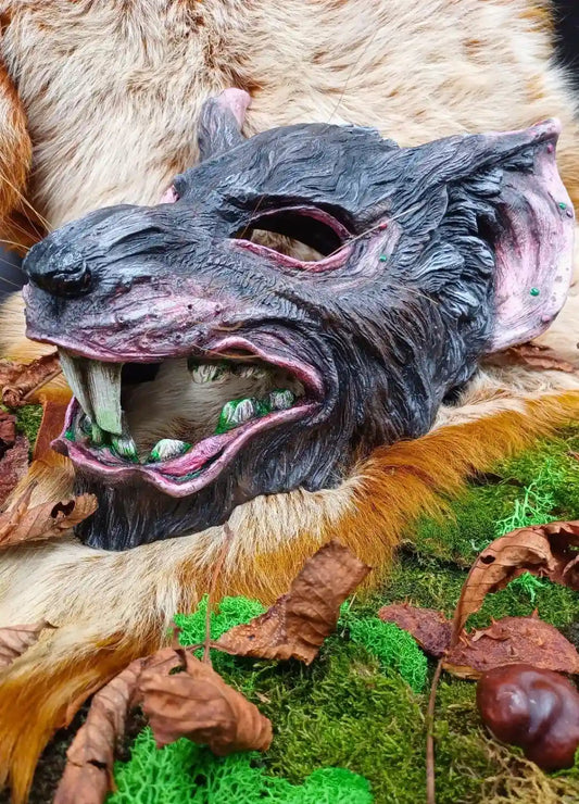 Close-up of a blank mask being transformed with acrylic paint. Great for cosplay enthusiasts and costume makers, featuring styles like Skaven masks, Warhammer, cyberpunk 2077, theater, and demon masks. A practical guide for step-by-step mask painting for LARP or themed costumes.