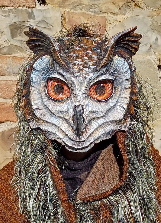 Handcrafted great horned owl mask with hood, made of resin and hand-painted, close-up view