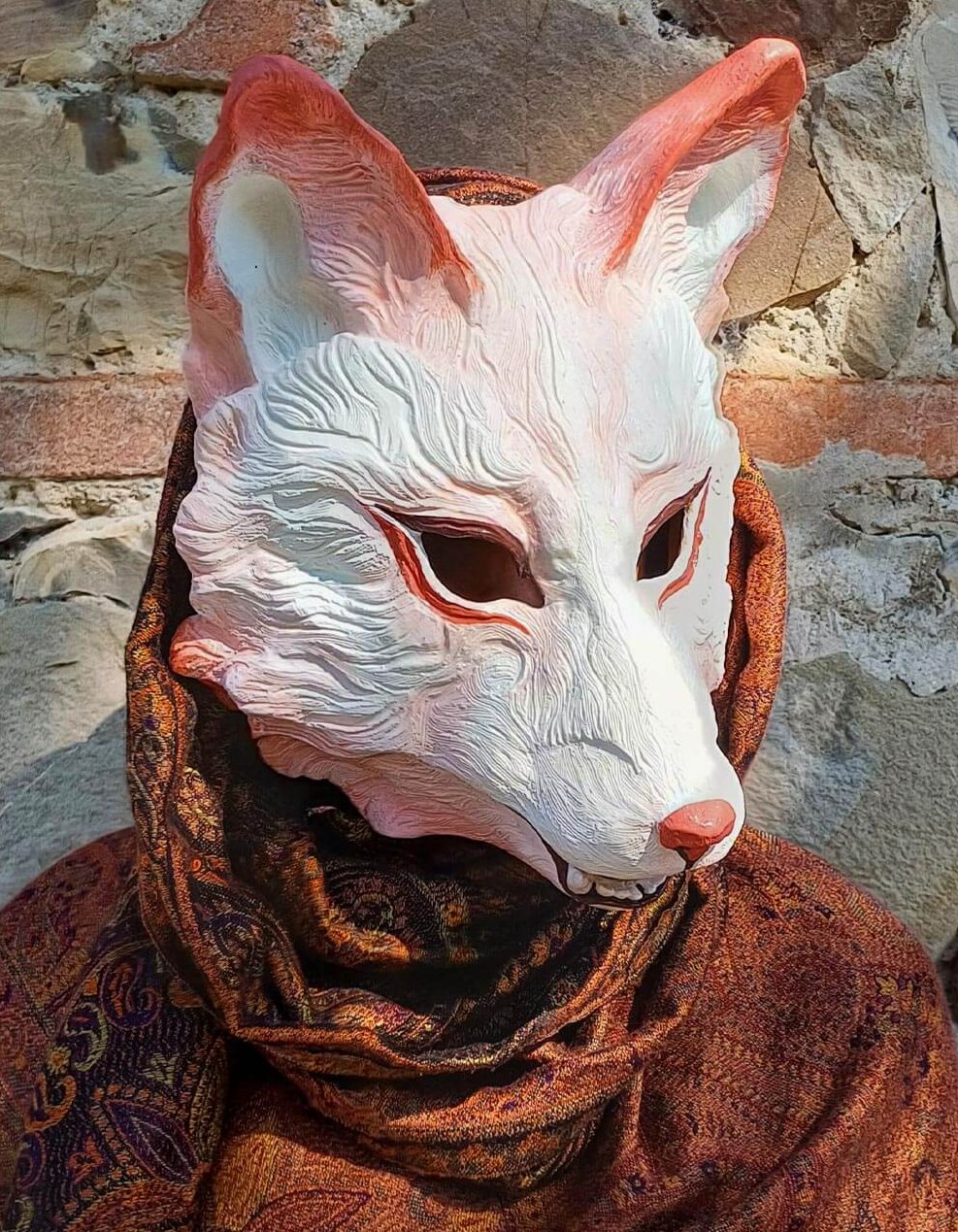 Detailed view of Huli Jing fox mask's facial features, emphasizing quality of resin casting.