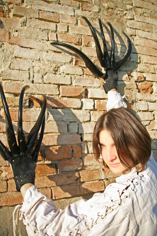 Finished example of realistic-looking monster claws made using the tutorial, highlighting the detail achievable with latex and paint.