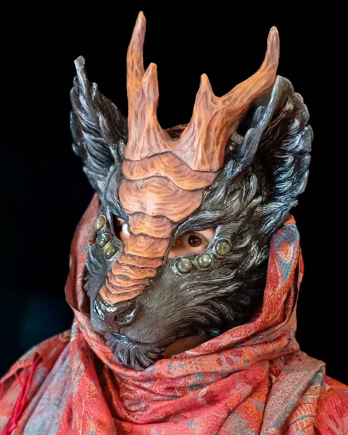 Handmade resin Qilin mask, highlighting the craftsmanship.