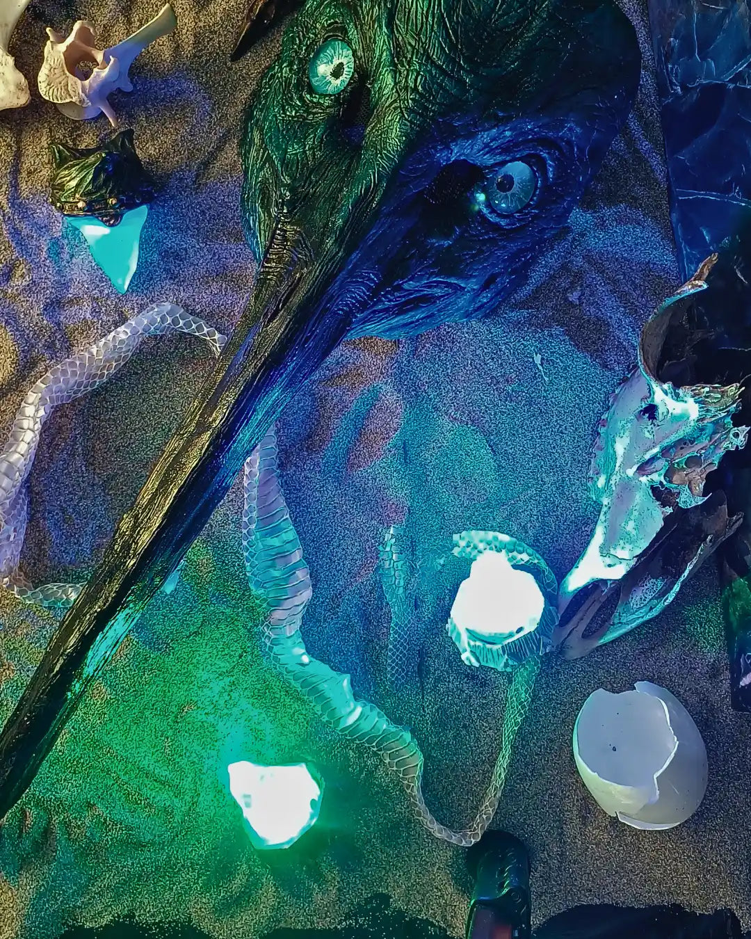 Mystical Thoth mask in resin with a luminous blue crystal. Part of the Wunderkammer Collection, inspired by ancient Egyptian gods and myths.