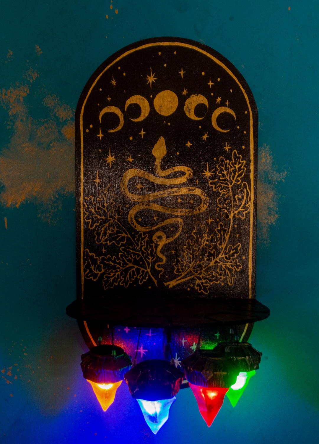 Wall-mounted gothic wooden necklace holder, displaying necklaces, gothic home decor.