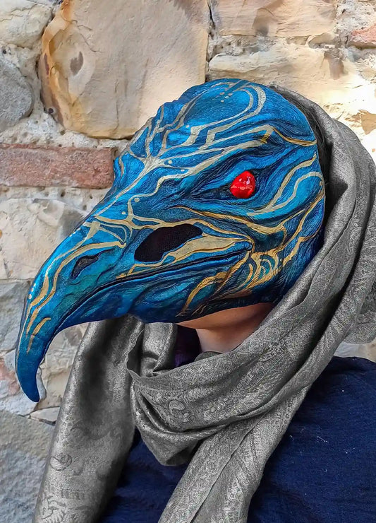 Valravn head sculpt mythological mask with red gemstone eye and long beak, inspired by folklore