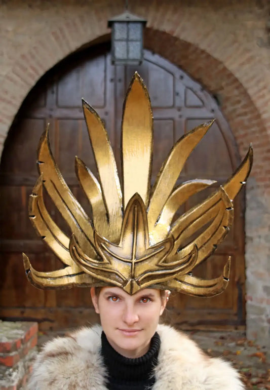 Close-up of handcrafted golden spikes with rubber finish – durable and rain-resistant cosplay headdress.