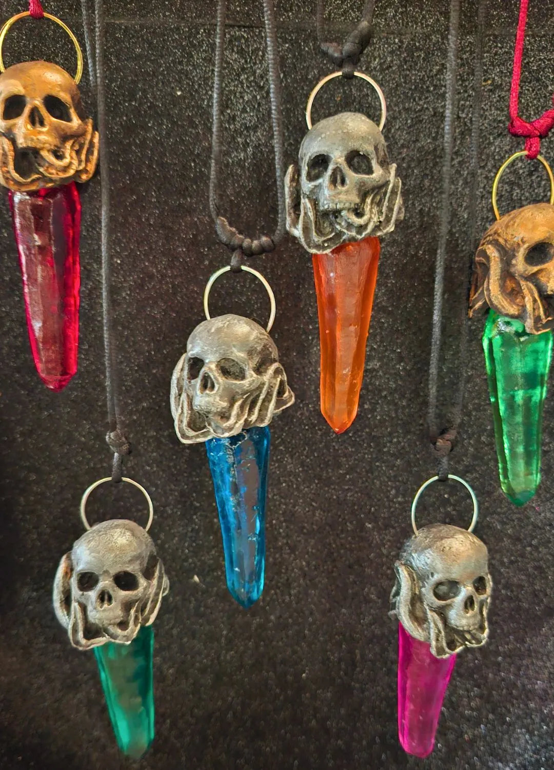 A finished handmade fantasy skull pendant charm packaged and ready to ship worldwide from the artisan Italian studio.