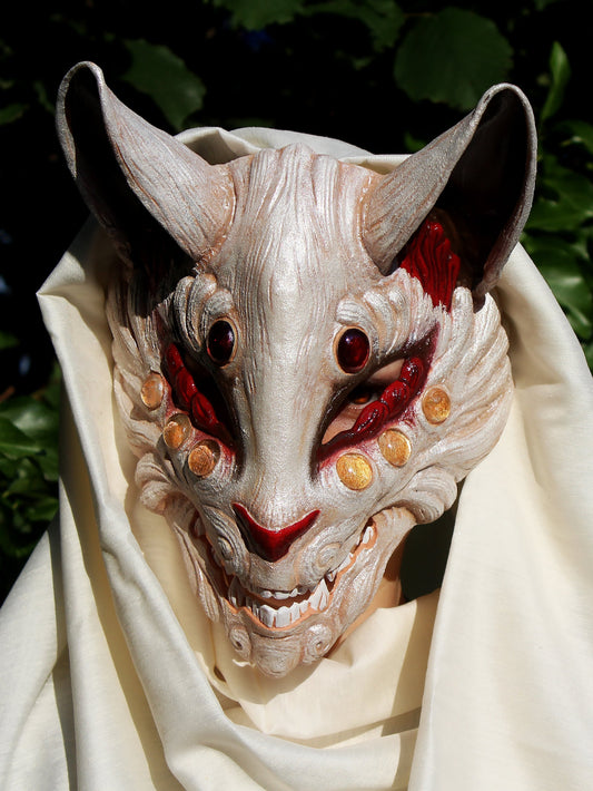 Japanese fox spirit mask, handcrafted from resin, with adjustable straps.