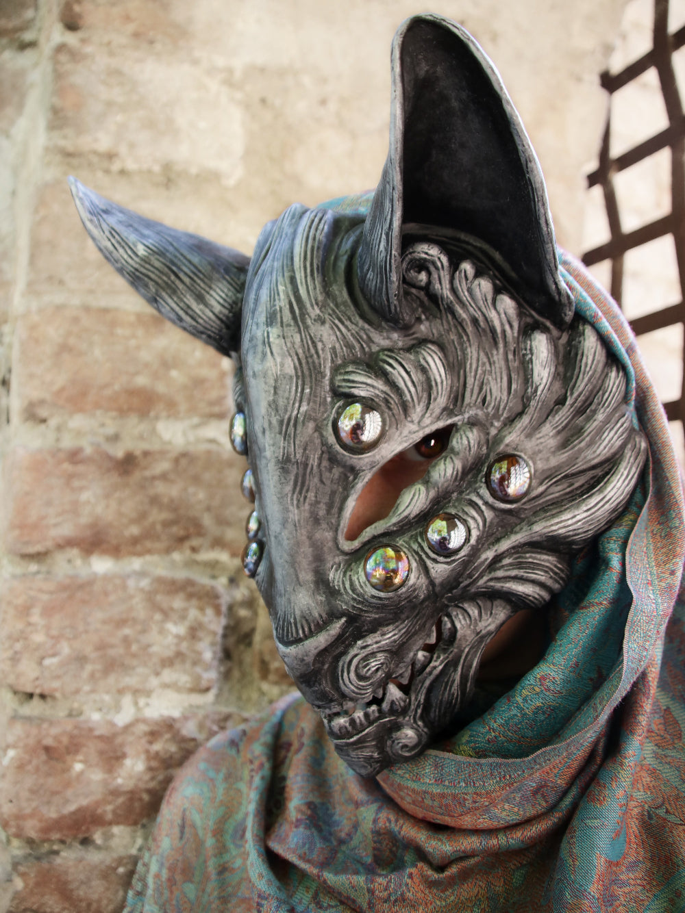 Customizable silver Kitsune yōkai mask, a unique piece of Japanese mythology.