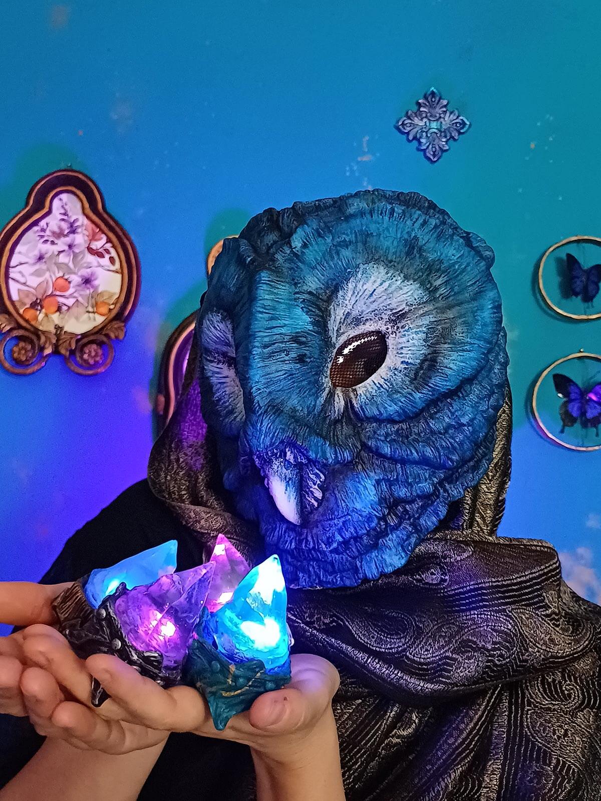 Close-up of the Fatuous Barn Owl mask, highlighting the resin texture and artistic finish.
