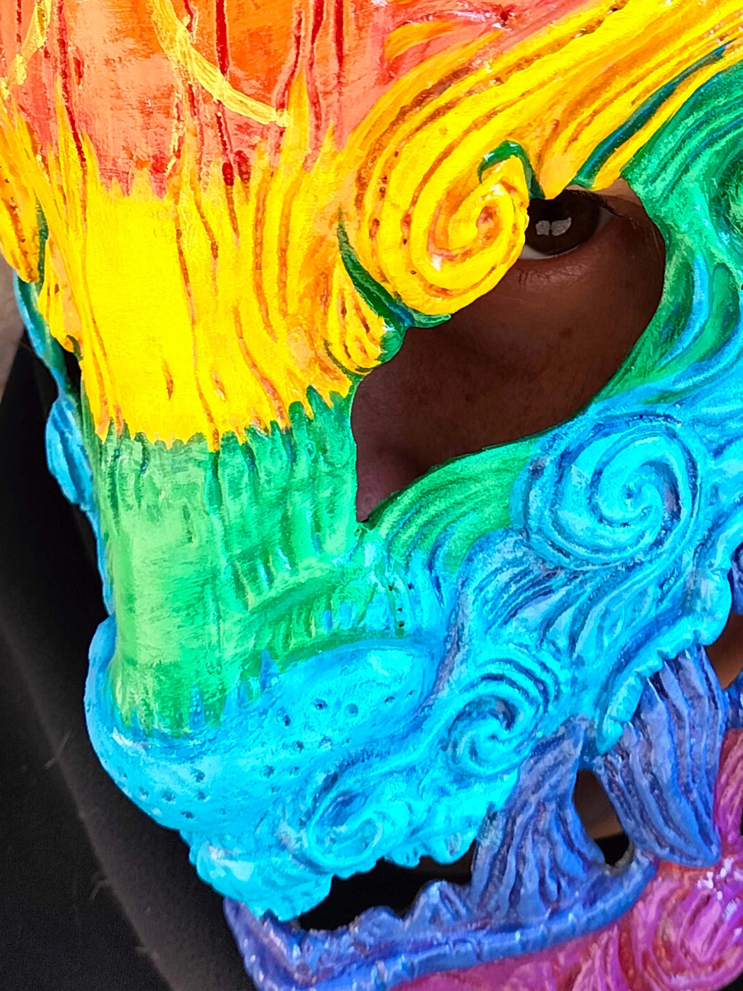 Focus detail Pride Oni mask with a durable and lightweight design.
