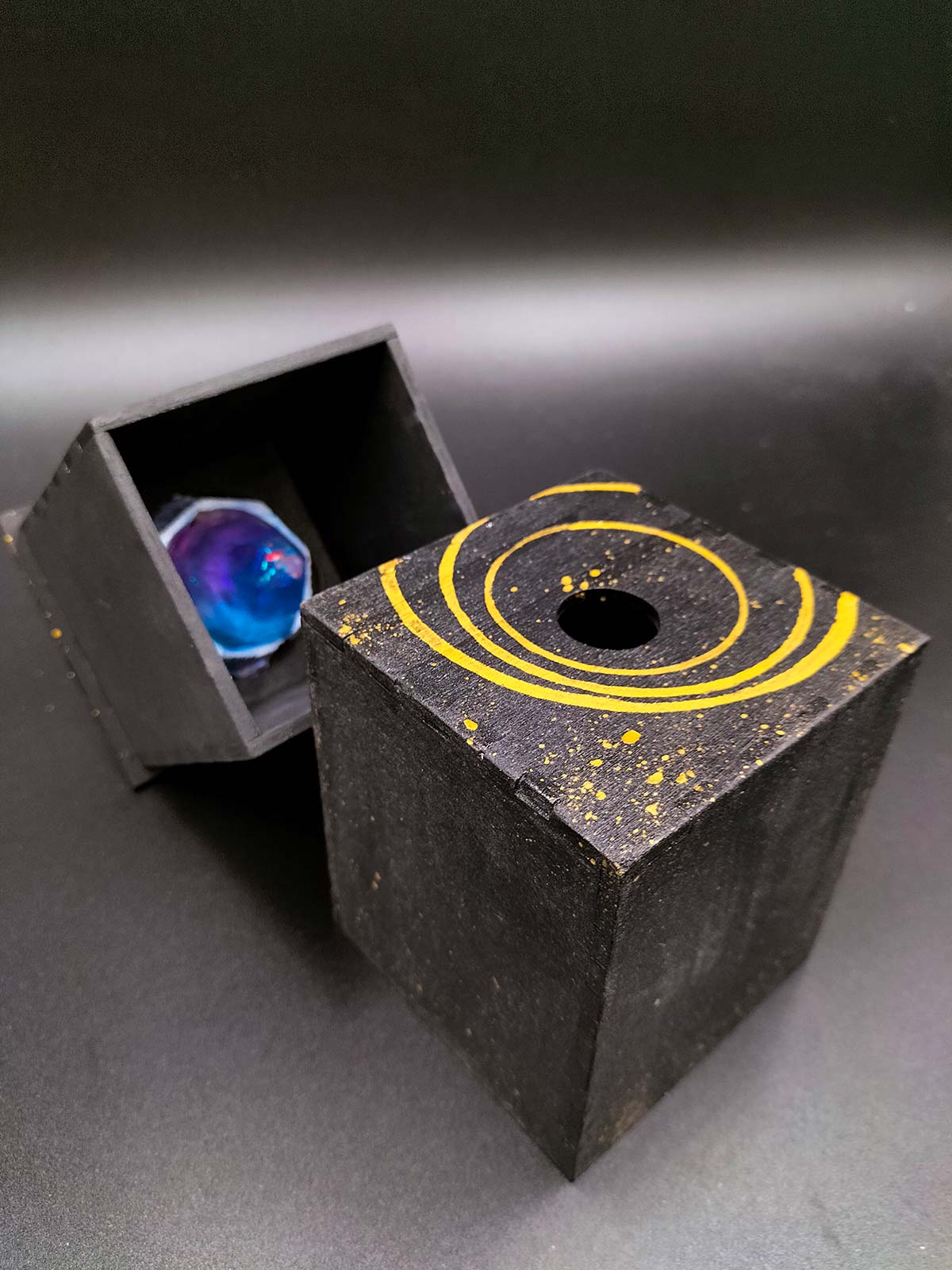 Open Deluxe Box revealing the foam padding and tissue paper, ready to hold Arcane Crystals.
