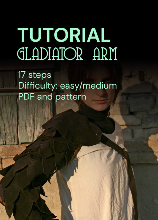 Step-by-step photo from the tutorial showing how to craft a leather arm cuff, highlighting the tools and materials used in the process.

