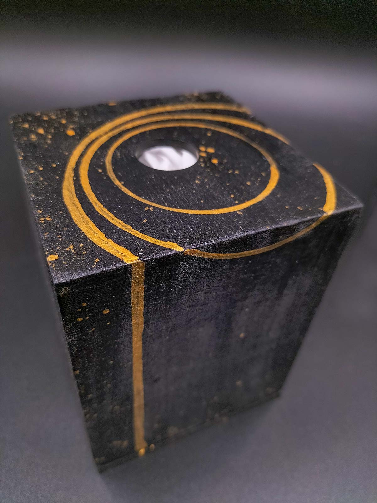 A Deluxe Box alongside an Arcane Crystal and the handwritten letter from the professor, suggesting a collector's set.