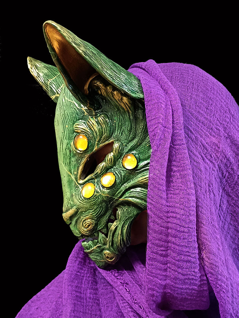 Unique green Kitsune mask for cosplay, LARP, and themed events.
