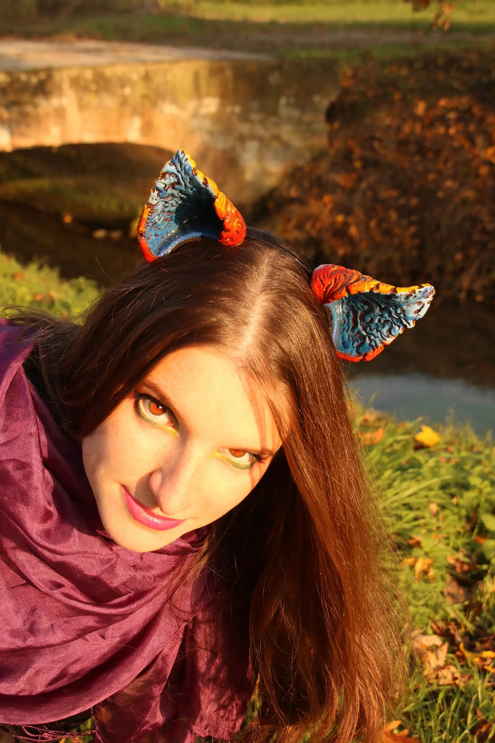 A person wearing the completed foam Nekomimi ears, demonstrating their suitability as a charming cosplay or LARP accessory.
