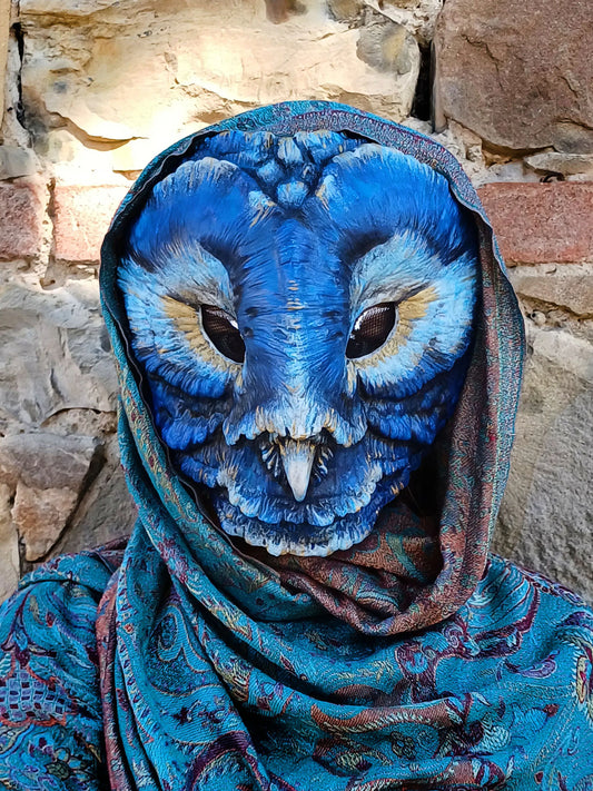 Regal Barn Owl resin mask with glowing eyes, showcasing the detail of its majestic face.