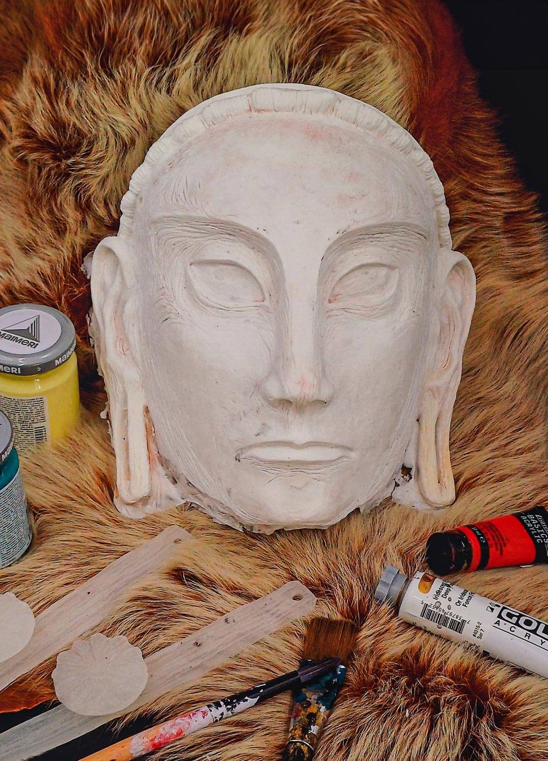 Blank white resin Stone Poet mask, ready for DIY painting and decoration.
