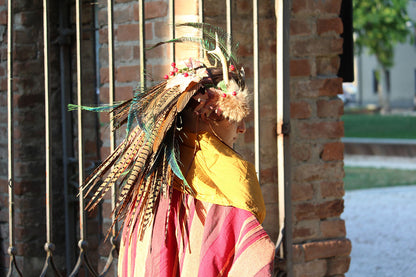 DIY project for a transformable feather headdress that becomes a tiara.