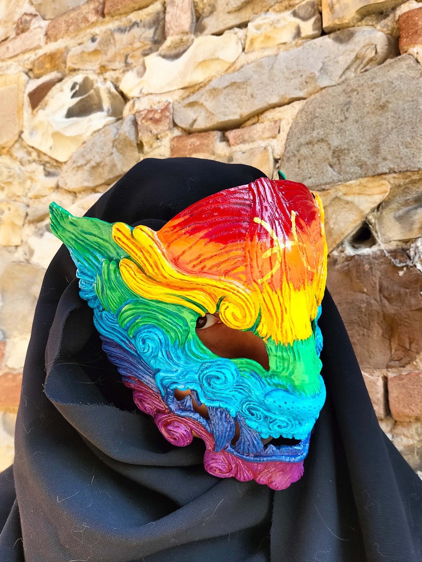 Unique Oni mask showcasing the rainbow flag, perfect for Pride cosplay.
