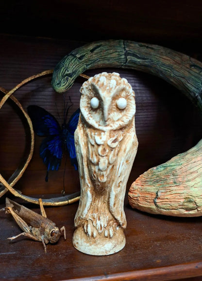 barn owl Detailed view of an ancient style collectible idol artifact showing a customized bright red eye finish hand-painted in the Chimerical Dragonfly studio.