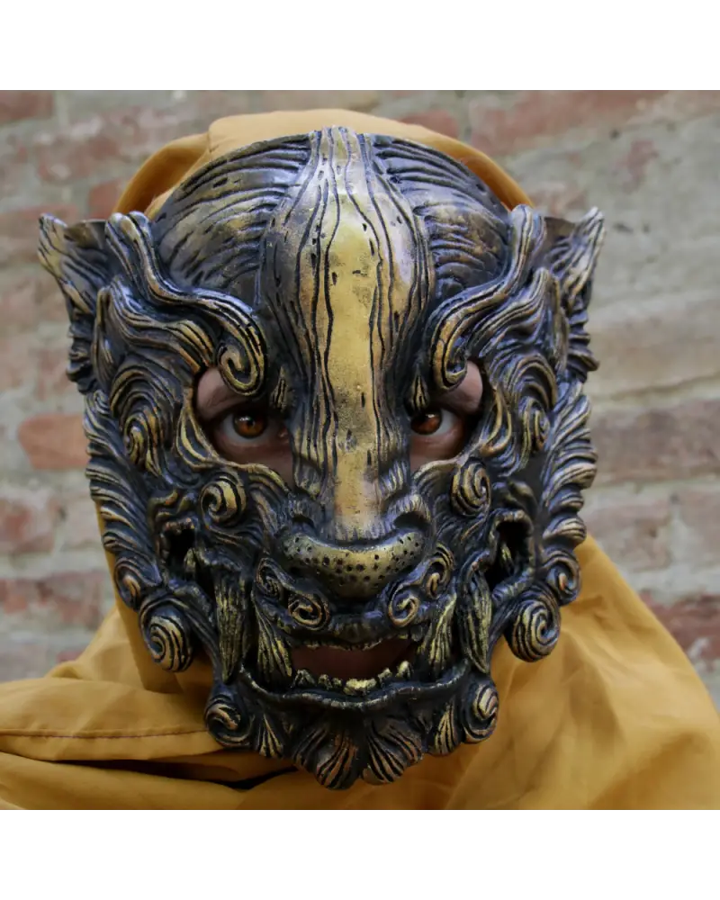 Handcrafted black Oni mask made of resin, inspired by Japanese yōkai demons, with gold detailing and an oxidized finish, ideal for cosplay, LARP, and themed events