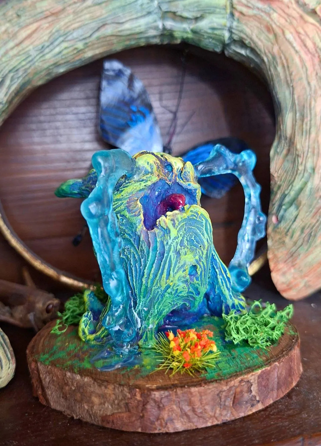 Broken Mandrake sculpture apothecary style oddities display piece, handcrafted resin collectible with moss base and dark fantasy aesthetic