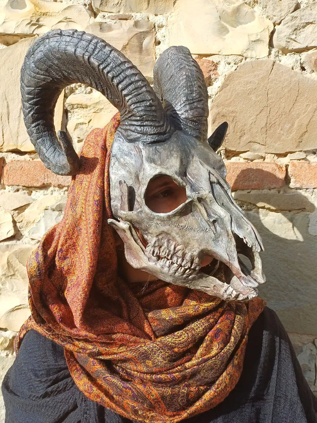 demon skull goat mask with carved markings