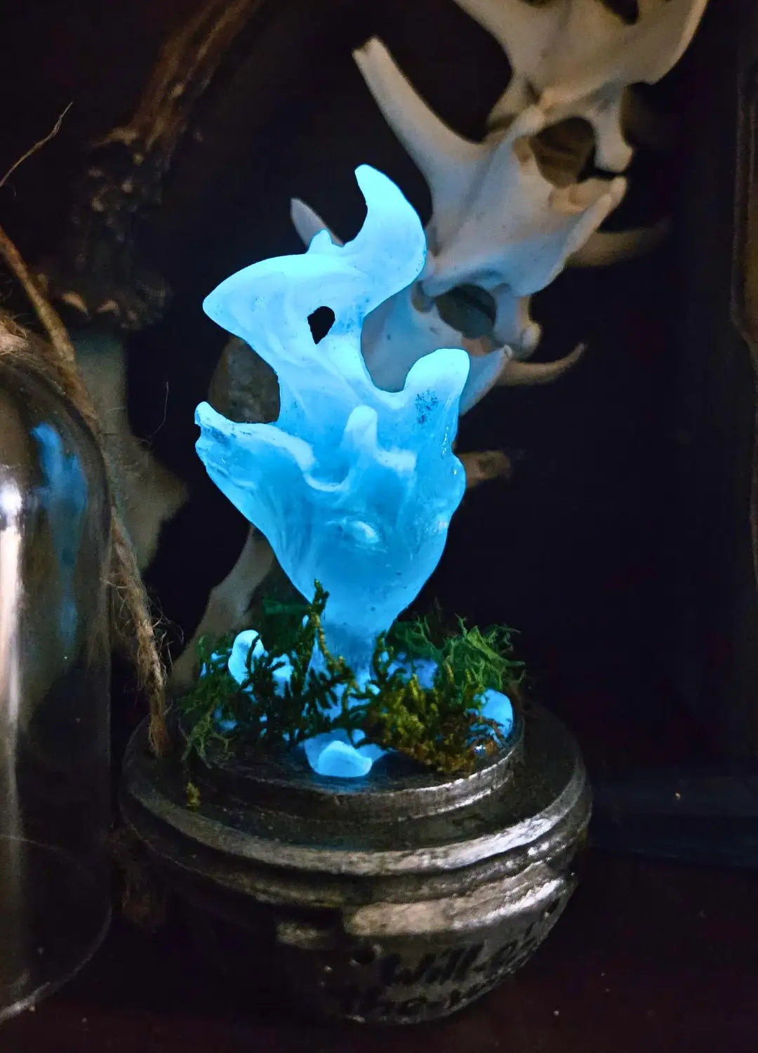 Fantasy resin will o wisp dnd accessory displayed under plastic cloche