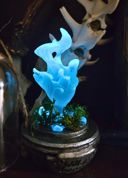 Fantasy resin will o wisp dnd accessory displayed under plastic cloche