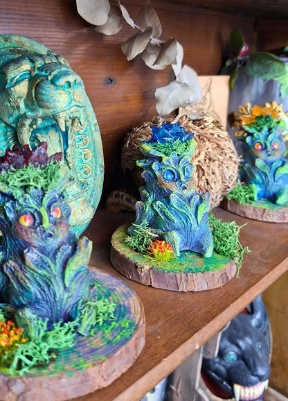 Handmade Lumen Mandrake fantasy plant collectible sculpture displayed on a wooden base.