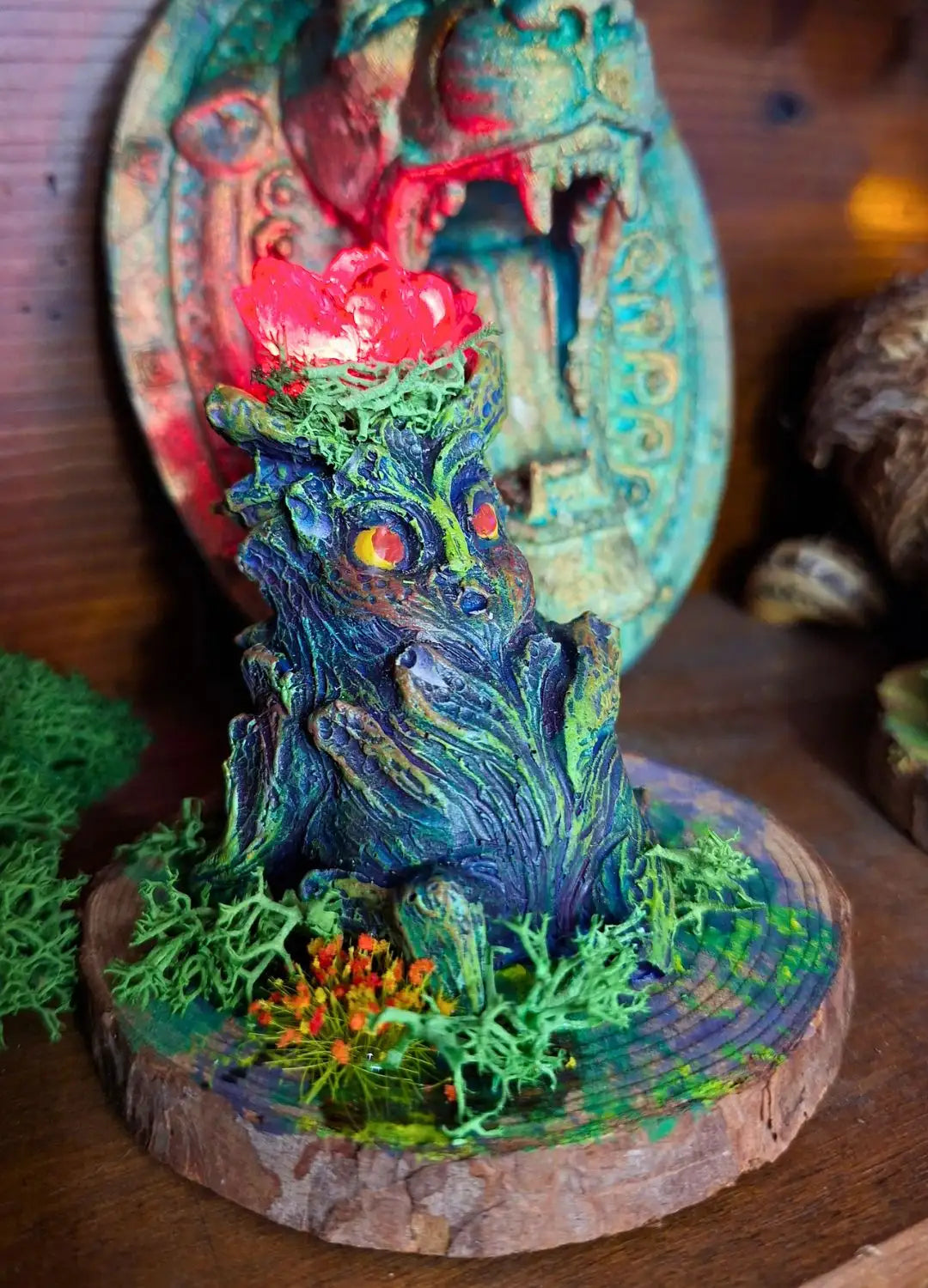 Lumen Mandrake displayed among fantasy collectibles in a curiosity cabinet and bookshelf setting.