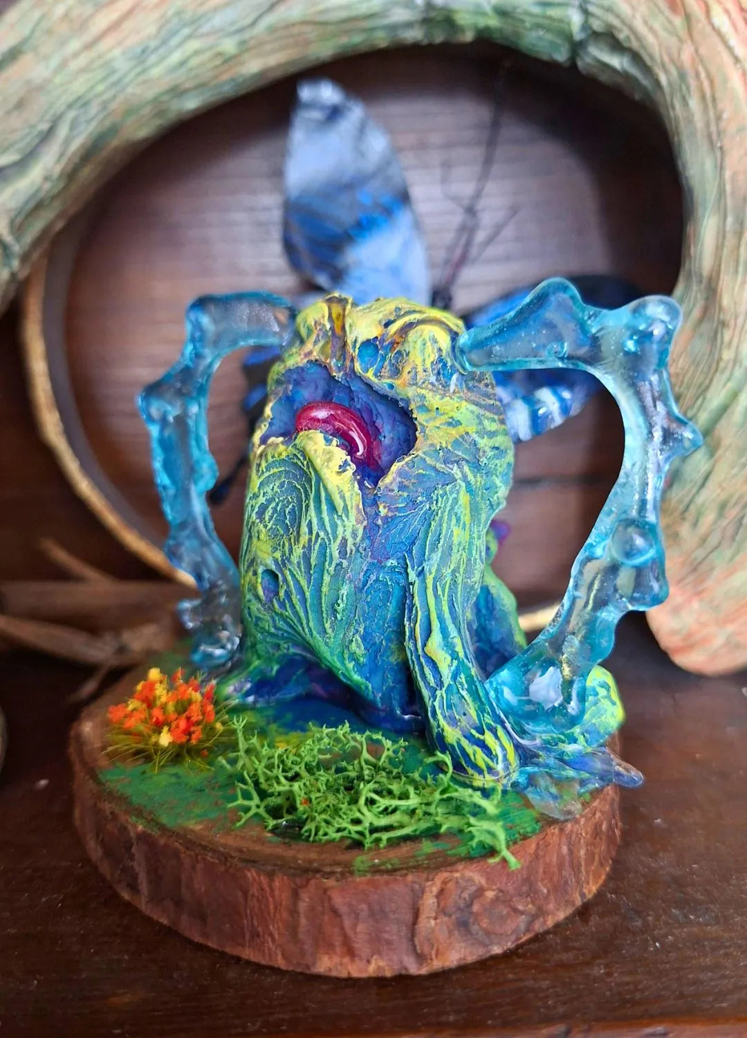 Mandrake resin statue fantasy botanical horror design, expressive cursed plant creature with elongated limbs and open mouth, tabletop RPG decor