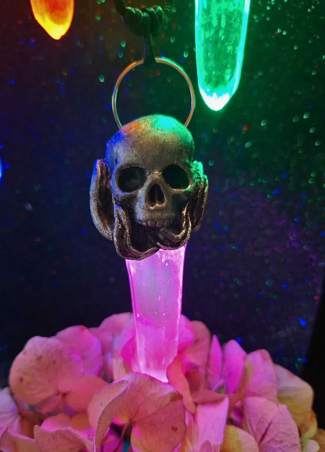 The soulbound crystal necklace displayed alongside the Lumen Mandrake and ancient idols from the Chimerical Dragonfly fantasy ecosystem.