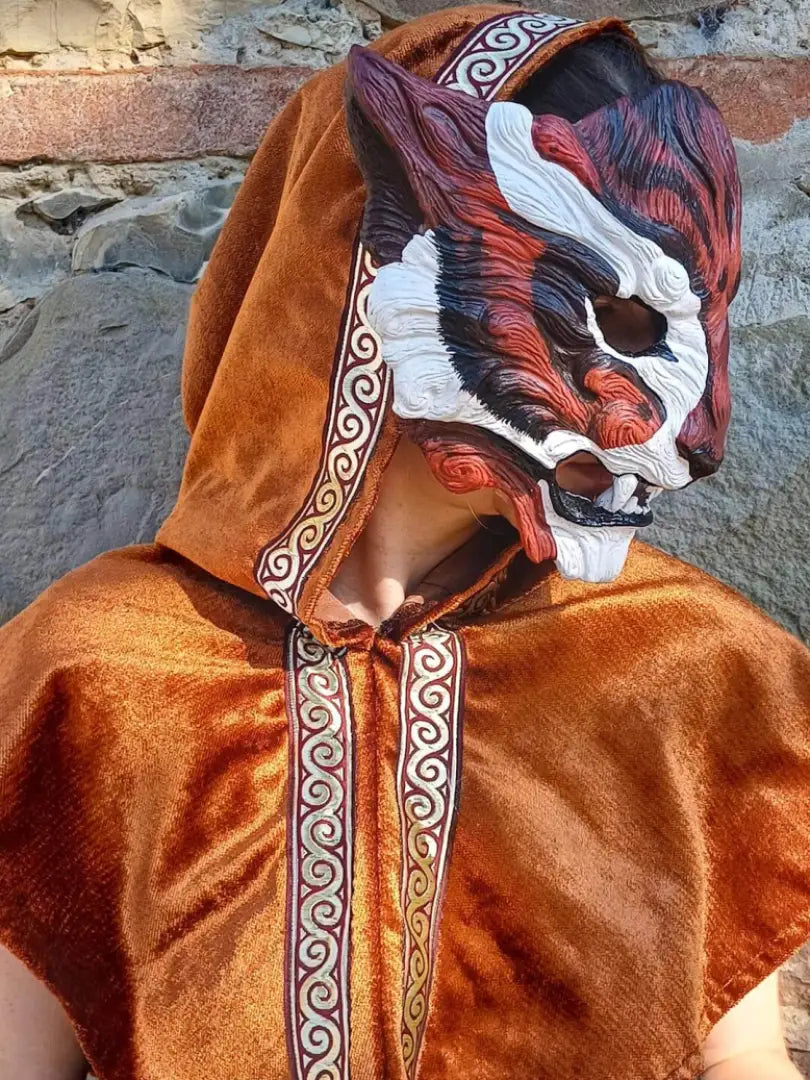 Bau Hu mask painted with vibrant colors and detailed designs, showing customization potential.