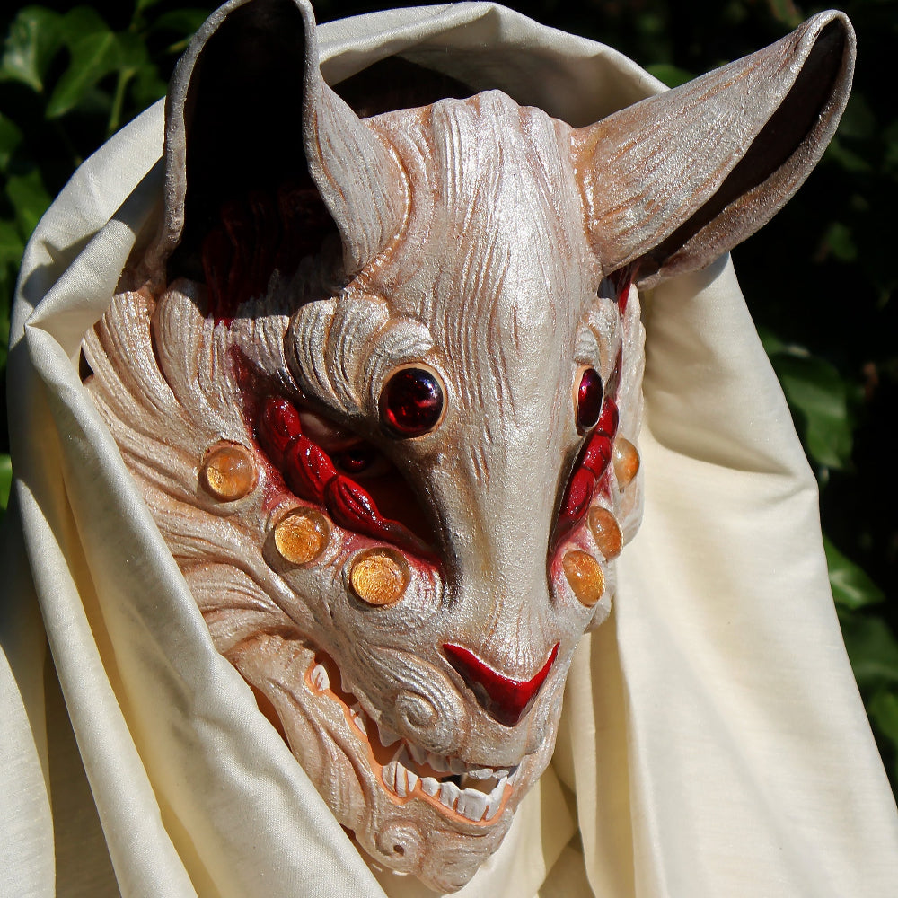 Handmade resin Kitsune mask, inspired by Japanese fox spirits.