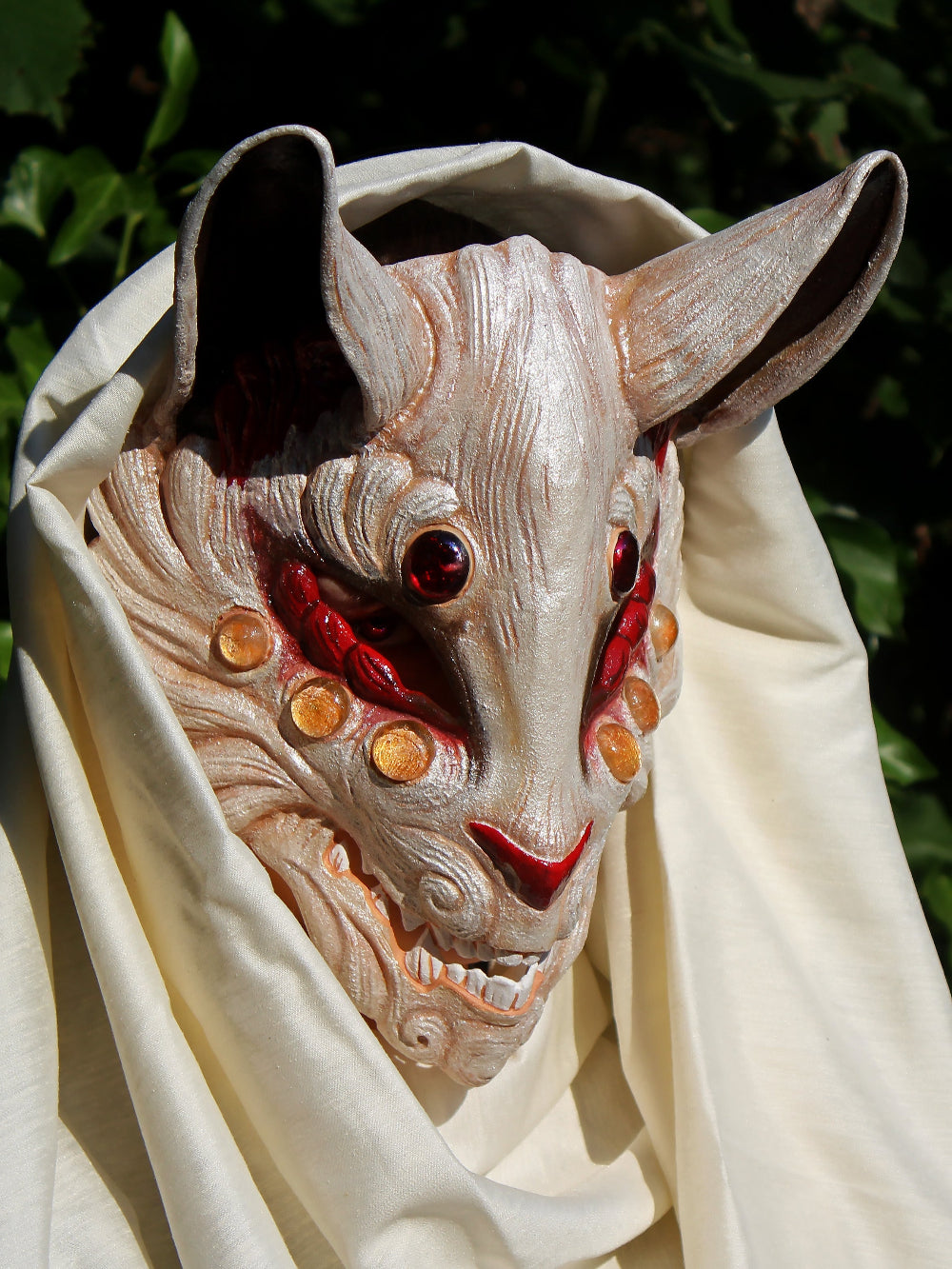 Water-resistant resin Kitsune mask with comfortable padding and secure elastics.
