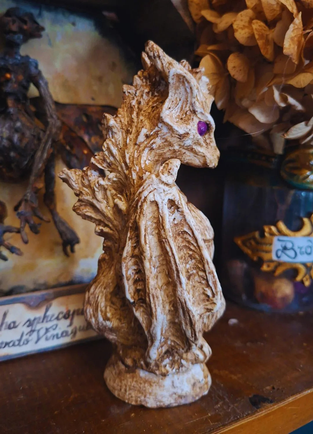 Frontal view of the sinuous Wind Dragon statue, showing its weightless and aerodynamic silhouette inspired by modern fantasy creatures.
